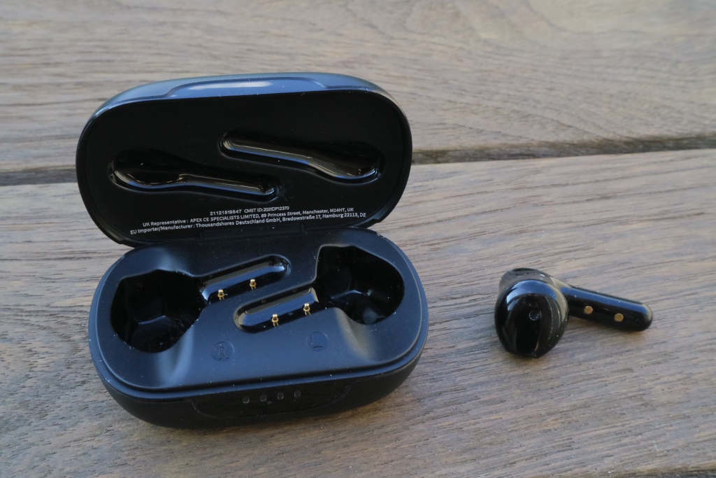 Flybuds C2 charging case with one earbud